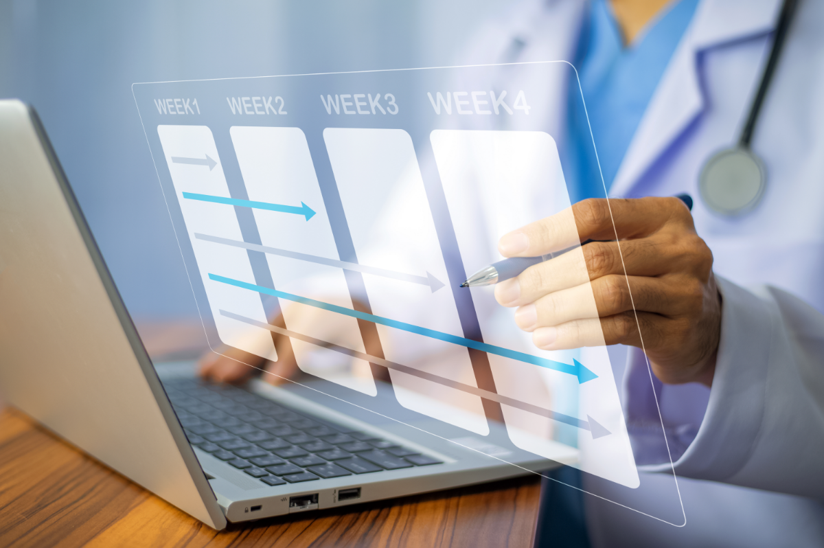 Employee looking at compyter for wellness calendar