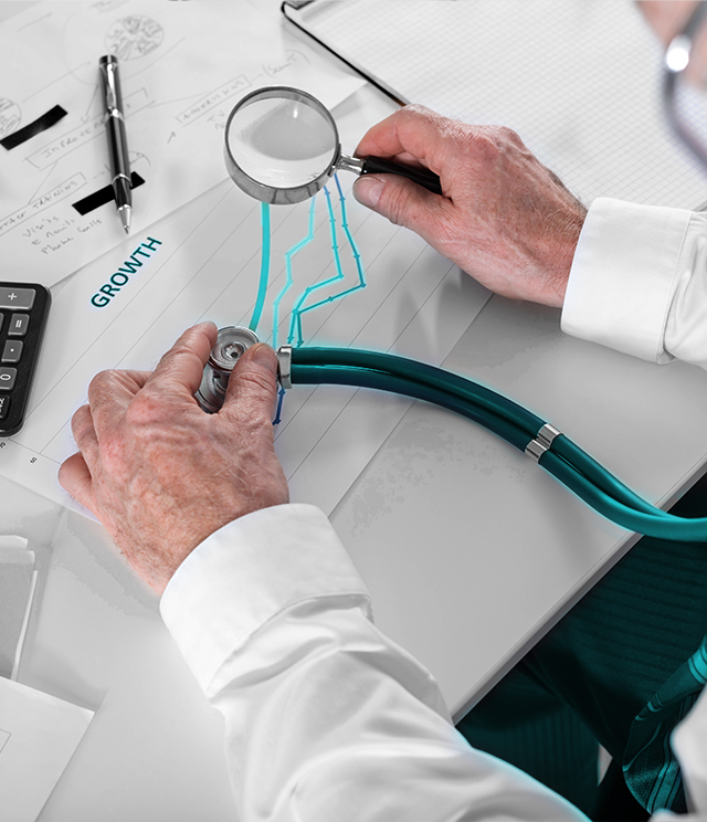 doctor hands holding stethoscope and magnifying glass