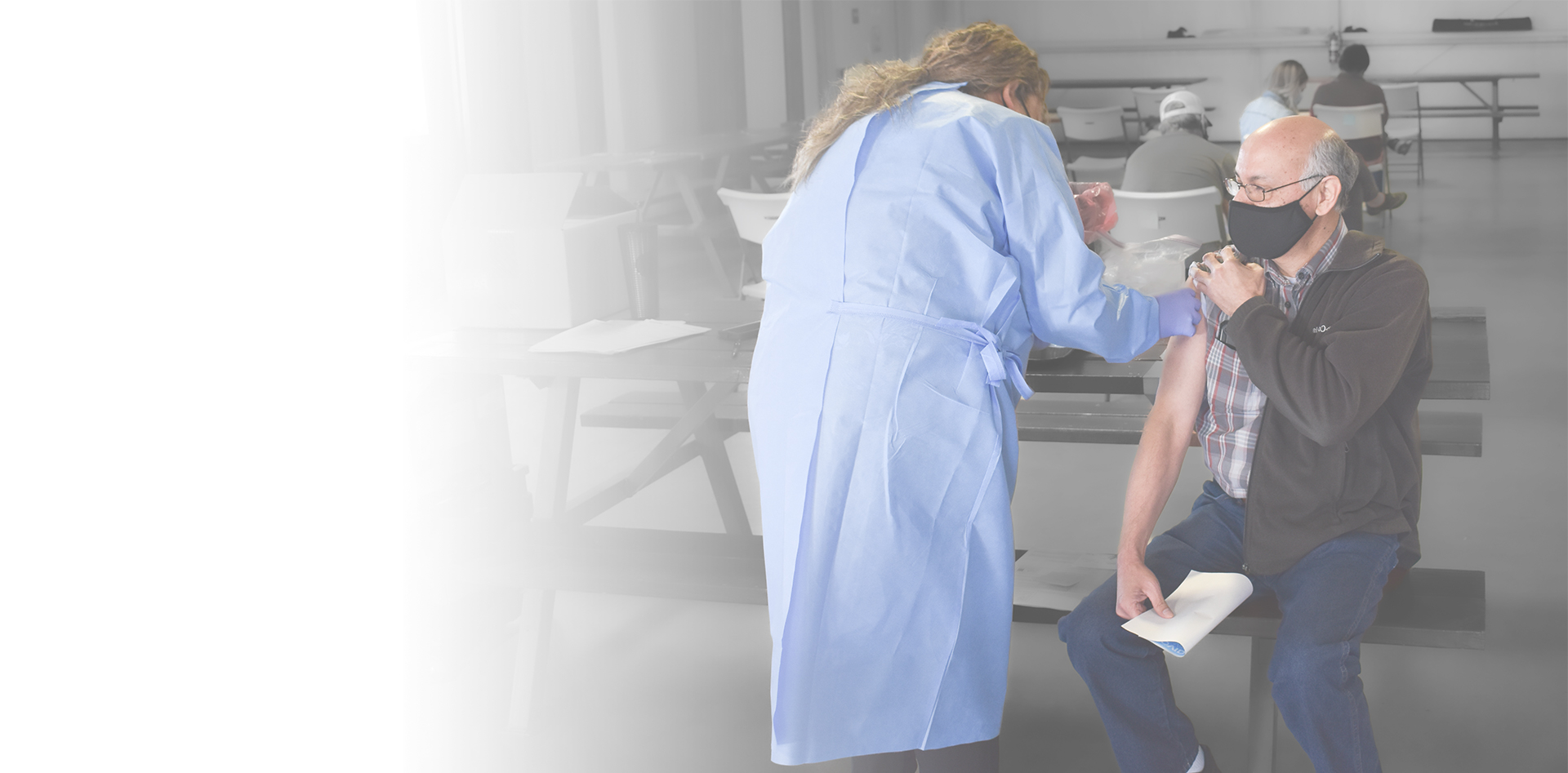 Workplace nurse treating employee