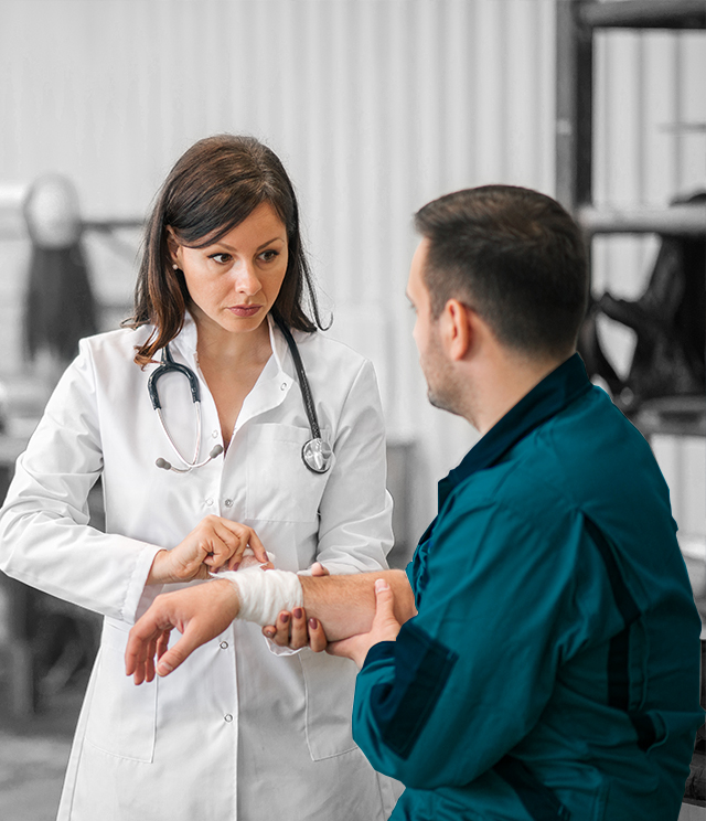 on worksite doctor treating employee arm injury